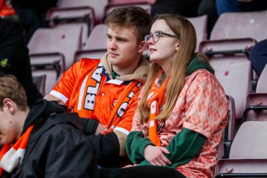 Blackpool taraftarları 22 Mart 2025 'te İngiltere' nin Northampton şehrindeki Sixfields Stadyumu 'nda oynanan Northampton Town-Blackpool maçına bakıyorlar.