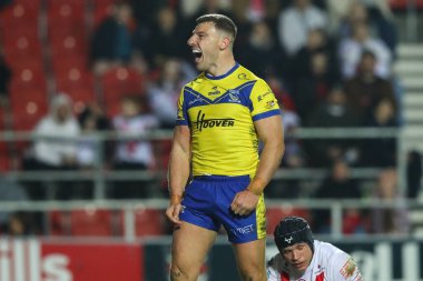 Warrington Wolves 'tan George Williams, 21 Mart 2025' te St Helens vs Warrington Wolves 'a karşı oynanan Betfred Süper Lig maçında 2-4' lük galibiyetini kutluyor.