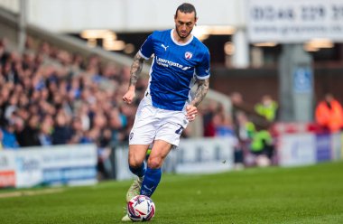 Chesterfield 'dan Oliver Banks, 22 Mart 2025' te İngiltere 'nin Chesterfield şehrindeki SMH Group Stadiumact Stadyumu' nda oynanan Sky Bet 2 karşılaşmasında maç yapıyor.