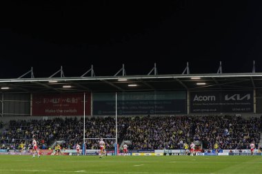 Warrington Wolves taraftarları 5. Betfred Süper Lig karşılaşması sırasında St Helens vs Warrington Wolves ile Wicked Stadyumu, St Helens, Birleşik Krallık, 21 Mart 2025