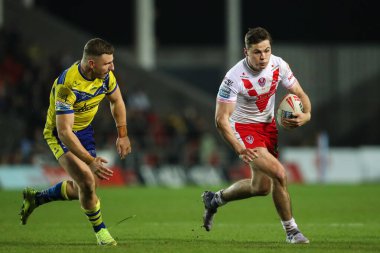 St. Helens 'den Jack Welsby, 21 Mart 2025' te St Helens - Wicked Stadyumu, St Helens - Warrington Wolves maçında topa vurdu.