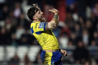 Warrington Wolves takımından Matty Ashton, 21 Mart 2025 'te St Helens - Warrington Wolves maçında şansını denedi.