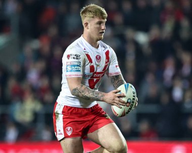 St. Helens 'den George Delaney, Betfred Süper Lig 5. Raundunda topla birlikte St Helens' e karşı Warrington Wolves maçı, St Helens Stadyumu, 21 Mart 2025