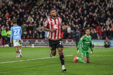 Sheffield United takımından Tyrese Campbell, 28 Mart 2025 'te Sheffield, İngiltere' deki Bramall Lane Coventry City 'de oynanan Sky Bet Şampiyonası maçında 2-0' lık galibiyetini kutluyor.