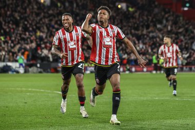 Sheffield United takımından Rhian Brewster, 28 Mart 2025 'te Bramall Lane, Sheffield, İngiltere' de oynanan Sky Bet Şampiyonası maçında 3-0 'lık galibiyet golünü kutluyor.