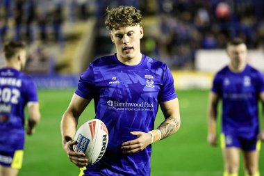 Warrington Wolves takımından Arron Lindop, Betfred Süper Lig 6. raundunda ısınma turunda Warrington Wolves, Leeds Rhinos 'a karşı Halliwell Jones Stadyumu, Warrington, Birleşik Krallık, 28 Mart 2025