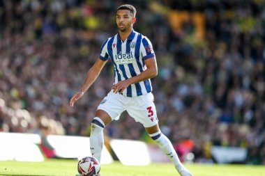 West Bromwich Albion takımından Mason Holgate, 29 Mart 2025 'te İngiltere' nin Norwich City-West Bromwich Albion maçında topla koşuyor.