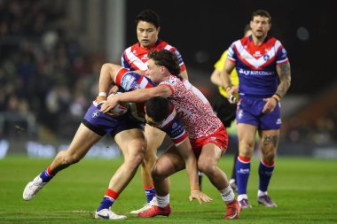 Wakefield Trinity 'den Isaiah Vagana, Leigh Leopards' dan Lachlan Lam tarafından 28 Mart 2025 'te Leigh Sports Village, Leigh, İngiltere' deki Leigh Spor Köyü 'nde Leigh Leopards - Wakefield Trinity maçında yere serildi.