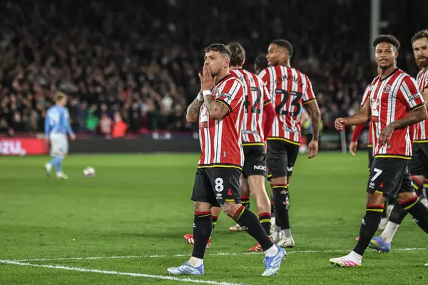 Sheffield United takımından Gustavo Hamer, 28 Mart 2025 'te Sheffield Lane, Sheffield, İngiltere' de oynanan Sky Bet Şampiyonası maçında 1-0 'lık galibiyetini kutluyor.