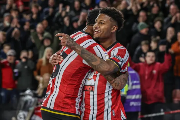 Sheffield United takımından Rhian Brewster, 28 Mart 2025 'te Bramall Lane, Sheffield, İngiltere' de oynanan Sky Bet Şampiyonası maçında 3-0 'lık galibiyet golünü kutluyor.