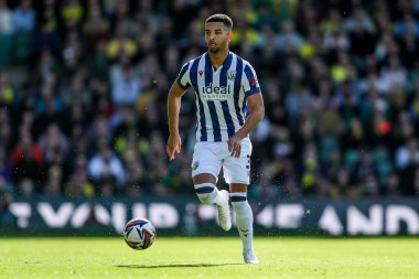 West Bromwich Albion takımından Mason Holgate, 29 Mart 2025 'te İngiltere' nin Norwich City-West Bromwich Albion maçında topla koşuyor.