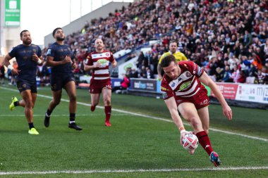 Wigan Warriors 'dan Jake Wardle 30 Mart 2025' te Wigan Warriors 'a karşı Salford Red Devils' in oynadığı Betfred Süper Lig 6. Raundunda skoru 4-0 yaptı.