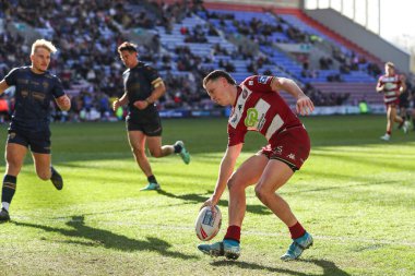 Wigan Warriors 'dan Jai sahaya çıkıyor ve skor 46-0 Betfred Süper Lig 6. Raundda Wigan Warriors - Salford Red Devils maçında Wigan, Wigan, Birleşik Krallık' taki Brick Community Stadyumu 'nda 30 Mart 2025 tarihinde oynanacak.