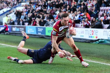 Wigan Warriors takımından Jake Wardle 30 Mart 2025 'te Wigan Warriors' a karşı Salford Red Devils maçında skoru 14-0 yaptı.