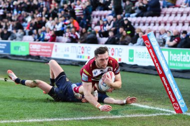 Wigan Warriors takımından Jake Wardle 30 Mart 2025 'te Wigan Warriors' a karşı Salford Red Devils maçında skoru 14-0 yaptı.