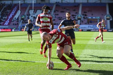 Wigan Warriors takımından Liam Marshall 30 Mart 2025 'te Wigan Red Devils' e karşı oynanan Betfred Süper Lig 6. Raundunda skoru 26-0 yaptı.