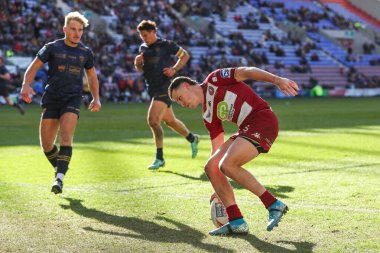 Wigan Warriors 'dan Jai sahaya çıkıyor ve skor 46-0 Betfred Süper Lig 6. Raundda Wigan Warriors - Salford Red Devils maçında Wigan, Wigan, Birleşik Krallık' taki Brick Community Stadyumu 'nda 30 Mart 2025 tarihinde oynanacak.