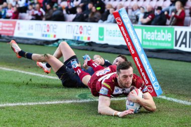 Wigan Warriors takımından Jake Wardle 30 Mart 2025 'te Wigan Warriors' a karşı Salford Red Devils maçında skoru 14-0 yaptı.