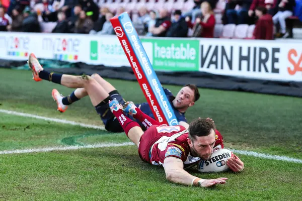 Wigan Warriors takımından Jake Wardle 30 Mart 2025 'te Wigan Warriors' a karşı Salford Red Devils maçında skoru 14-0 yaptı.