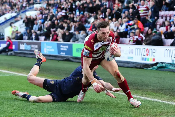 Wigan Warriors takımından Jake Wardle 30 Mart 2025 'te Wigan Warriors' a karşı Salford Red Devils maçında skoru 14-0 yaptı.