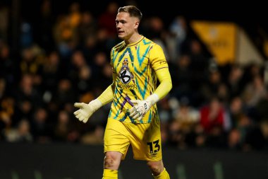 Cambridge United takımından Nathan Bishop, 1 Nisan 2025 'te Cambridge United ile Wrexham maçında tepki gösterdi.