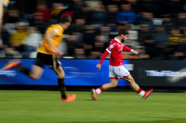 Wrexham AFC 'den Elliot Lee, 1 Nisan 2025' te Cambridge United ile Wrexham maçında Abbey Stadyumu, Cambridge 'de karşılaşacak.