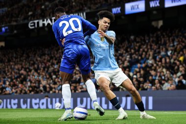 Manchester City 'den Nico O' Reilly ve Leicester City 'den Patson Daka Premier League maçı sırasında Etihad City ile Leicester City arasında 2 Nisan 2025' de Etihad Stadyumu 'nda mücadele ettiler.