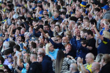 Warrington Wolves taraftarları Betfred Challenge Kupası çeyrek final maçı sırasında Warrington Wolves St. Helens 'e karşı Halliwell Jones Stadyumu, Warrington, İngiltere, 5 Nisan 2025