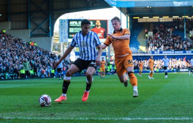 Sheffield 'li Shea Charles Çarşamba günü Hull City' den Joe Gelhardt 'ı 5 Nisan 2025' te Sheffield Çarşamba günü Hillsborough, Sheffield, İngiltere 'de Hull City maçında durdurdu.