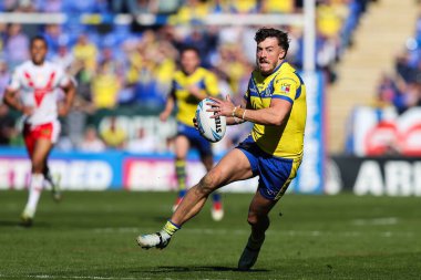 Warrington Wolves 'tan Matty Ashton, 5 Nisan 2025' te Halliwell Jones Stadyumu, Warrington, Birleşik Krallık 'ta oynanan Betfred Challenge Kupası çeyrek final karşılaşmasında topu aldı.