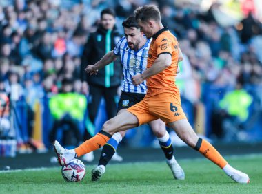 Sheffield 'li Pol Valentn Çarşamba günü Hull City' den Sean McLoughlin, Sheffield Çarşamba günü Hillsborough, Sheffield, Birleşik Krallık 'ta Hull City' ye karşı oynadığı maçta rakibini yere serdi.