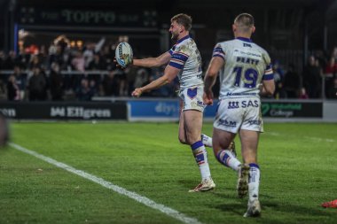 Wakefield Trinity 'den Josh Rourke, Birleşik Krallık' ın Wakefield şehrinde bulunan DIY Kitchens Stadyumu 'nda oynanan Betfred Challenge Kupası çeyrek final maçında şansını kutluyor.