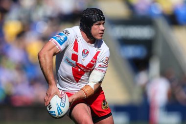 St. Helens takımından Jonny Lomax, 5 Nisan 2025 'te Halliwell Jones Stadyumu' nda oynanan Betfred Challenge Kupası çeyrek final maçı sırasında sahada.