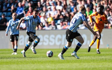 Sheffield Wednesday takımından Marvin Johnson, 5 Nisan 2025 'te Sheffield Wednesday' in Hillsborough, Sheffield, İngiltere 'de Hull City' e karşı oynadığı Sky Bet Şampiyonası maçında topu aldı.