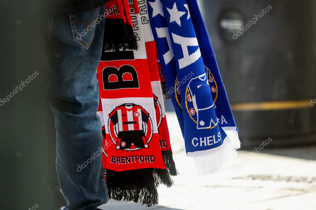 Brentford and Chelsea match scarves are sold outside of The Gtech Community Stadium prior to the Premier League match Brentford vs Chelsea at The Gtech Community Stadium, London, United Kingdom, 6th April 2025