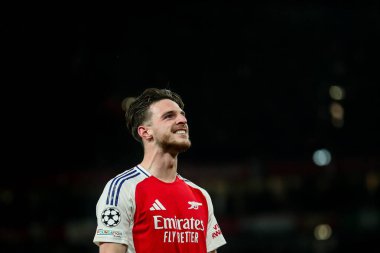 Arsenal 'den Declan Rice, UEFA Şampiyonlar Ligi çeyrek final maçı Arsenal' in Real Madrid 'e karşı Emirates Stadyumu, Londra, İngiltere' de 8 Nisan 2025 'te oynanan karşılaşma maçında 1-0' lık galibiyet golünü kutluyor.