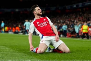 Arsenal 'den Declan Rice, UEFA Şampiyonlar Ligi çeyrek final maçı Arsenal' in Real Madrid 'e karşı Emirates Stadyumu, Londra, İngiltere' de 8 Nisan 2025 'te oynanan karşılaşma maçında 1-0' lık galibiyet golünü kutluyor.