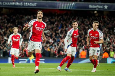 Arsenal 'den Mikel Merino, UEFA Şampiyonlar Ligi çeyrek final maçı Arsenal' in Real Madrid 'e karşı Emirates Stadyumu, Londra, İngiltere' de 8 Nisan 2025 'de oynanan karşılaşmada 3-0' lık galibiyet golünü kutluyor.