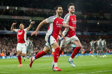 Arsenal 'den Mikel Merino, UEFA Şampiyonlar Ligi çeyrek final karşılaşmasında Declan Rice ile birlikte 8 Nisan 2025' te Londra, Emirates Stadyumu 'nda oynanan Arsenal - Real Madrid maçında attığı golü kutluyor.