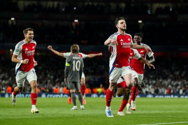 Arsenal 'den Declan Rice, UEFA Şampiyonlar Ligi çeyrek final maçı Arsenal' in Real Madrid 'e karşı Emirates Stadyumu, Londra, İngiltere' de 8 Nisan 2025 'te oynanan karşılaşma maçında 1-0' lık galibiyet golünü kutluyor.