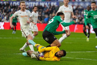 Swansea City kalecisi Lawrence Vigouroux, 9 Nisan 2025 'te Swansea.com Stadyumu' nda oynanan Sky Bet Şampiyonası maçında Plymouth Argyle 'dan Matthew Sorinola' yı kurtardı.