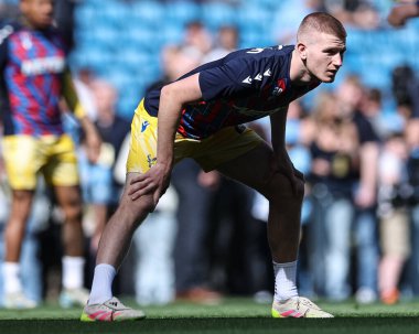 Kristal Saray 'dan Adam Wharton Premier Lig maçında ısınma turunda Manchester City, Etihad Stadyumu' nda Crystal Palace 'a karşı 12 Nisan 2025