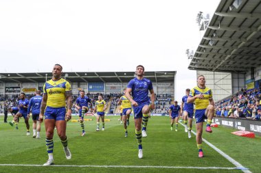 Warrington Wolves oyuncuları maç öncesi ısınma turunda Warrington Wolves vs Hull FC 'ye karşı Halliwell Jones Stadyumu, Warrington, İngiltere, 12 Nisan 2025