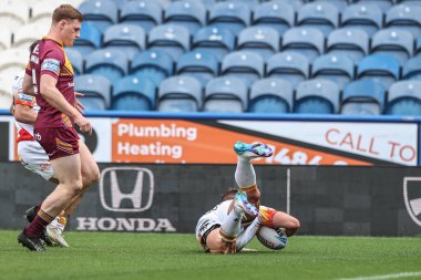 Katalan Ejderhaları 'ndan Tariq Sims, 13 Nisan 2025' te John Smith 'in Stadyumu' nda oynanan Betfred Süper Lig karşılaşmasında Huddersfield Giants ve Catalans Dragons maçına gidiyor.