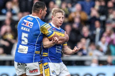 Leeds Rhinos takımından Lachlan Miller, 18 Nisan 2025 'te Leeds Stadyumu' nda oynanan 8. Betfred Süper Lig karşılaşmasında Leeds Rhinos ile Huddersfield Giants karşılaşmasını kutluyor.