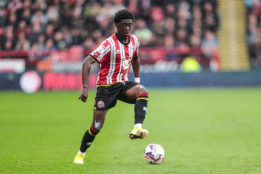 Sheffield United takımından Jesuran Rak-Sakyi 18 Nisan 2025 'te Bramall Lane, Sheffield, İngiltere' de Sheffield United ile Cardiff City arasındaki Sky Bet Şampiyonası maçında bir adım öne geçti.