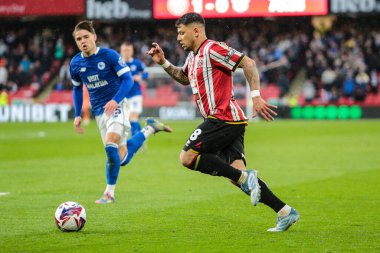 Sheffield United takımından Gustavo Hamer 18 Nisan 2025 'te Bramall Lane, Sheffield, İngiltere' de Sheffield United ile Cardiff City arasındaki Sky Bet Şampiyonası maçında topla koşuyor.