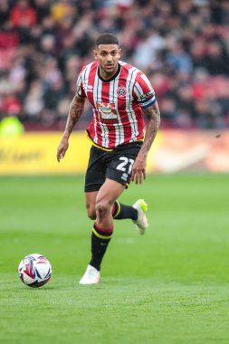 Sheffield United takımından Vinicius Souza 18 Nisan 2025 'te Bramall Lane, Sheffield, İngiltere' de Sheffield United ile Cardiff City arasındaki Sky Bet Şampiyonası maçında topla koşuyor.