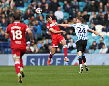 Sheffield Wednesday 'den Michael Smith, Middlesbrough Futbol Kulübü' nden Dael Fry 'a, 21 Nisan 2025' te Hillsborough, Sheffield, Birleşik Krallık 'ta Çarşamba günü Middlesbrough' a karşı oynanan Gökyüzü İddia Şampiyonası maçında baskı yapıyor.