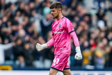 Millwall 'dan George Evans, 21 Nisan 2025' te İngiltere 'nin başkenti Londra' da oynanan Millwall-Norwich City maçında tepki gösterdi.